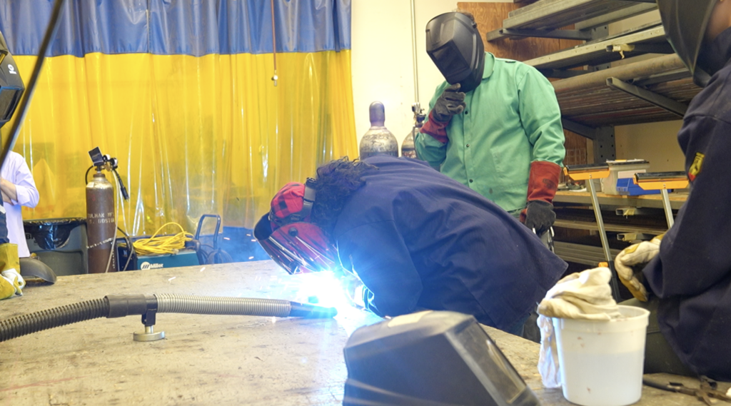 Connor McQuilken welds